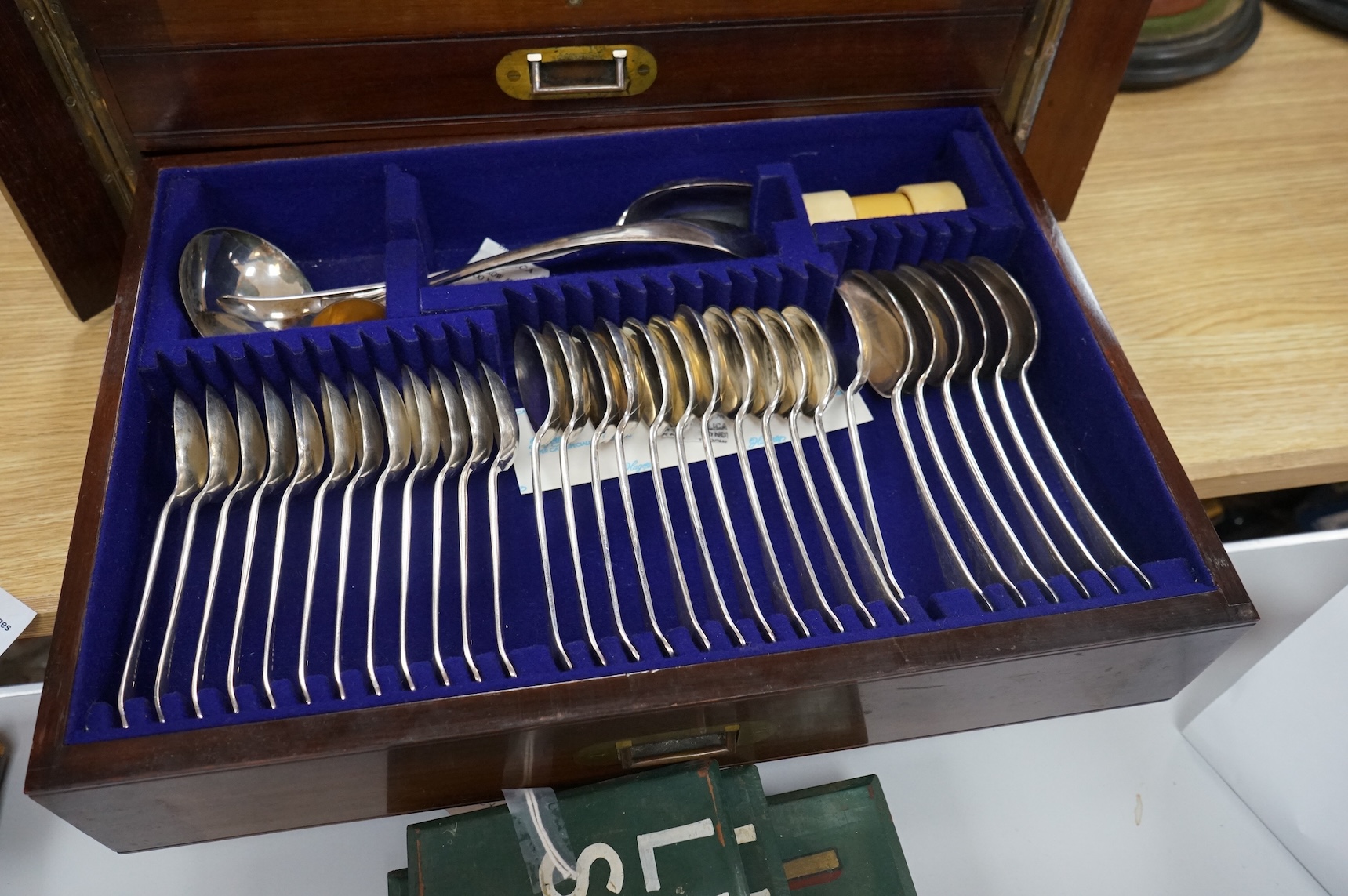 A Walker & Hall three-drawer canteen of plated cutlery. Canteen 48cm wide x 35cm deep x 24cm high. Condition - good